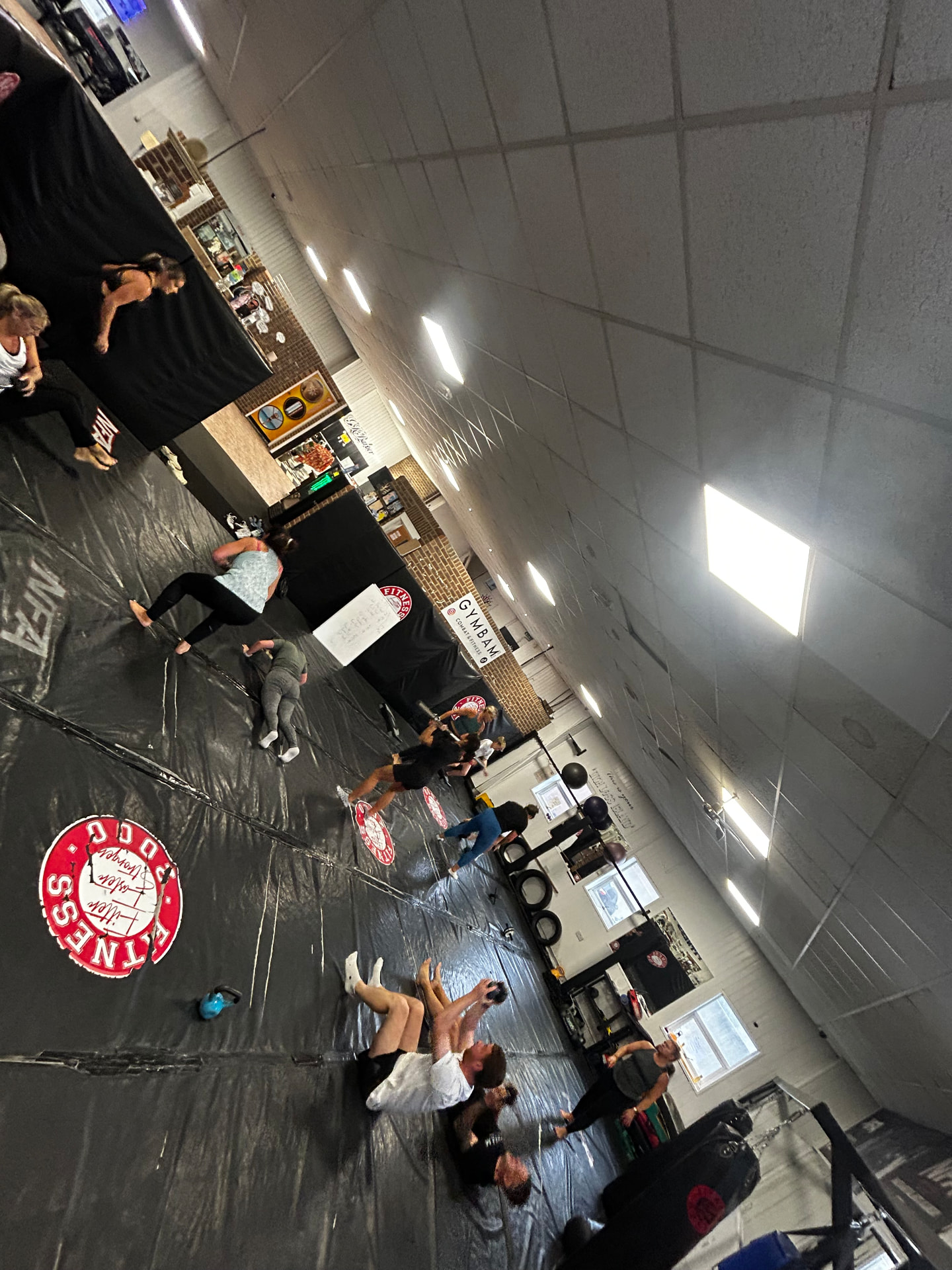 Group fitness training on the mats at Fitness2000